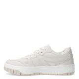 Championes urbanos de plataforma, color beige, con diseño de paneles cosidos, cierre de cordones al tono y suela de goma con relieve.