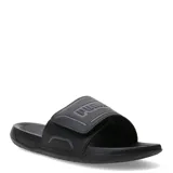 Sandalias Puma modelo Royalcat Comfort 2, color negro con detalles en gris. Presentan una banda superior ajustable con el logo de la marca en relieve y una plantilla ergonómica diseñada para mayor comodidad.