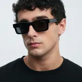 Lentes de sol cuadrados negros con montura de bio-based G850 y patillas de propionato de celulosa.