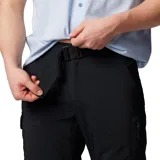 Pantalón largo de senderismo convertible en short, color negro, con tecnología Omni-Wick para absorción de humedad y Omni-Shade UPF 50 para protección solar. Cuenta con cintura parcialmente elástica, cinturón extraíble, bolsillos laterales, bolsillo de seguridad con cremallera, bolsillo cargo con cierre de velcro y perneras desmontables con cremallera.