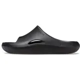 Sandalias tipo slide de una sola pieza, color verde oliva, con diseño ergonómico y contemporáneo. Presentan una abertura lateral en la parte superior y una suela gruesa con textura acanalada.