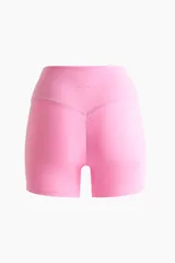 Bikers deportivas de tiro alto en color rosado, confeccionadas con tejido funcional SculptMove que realza la silueta y ofrece sujeción. Cuentan con cintura ancha y tecnología DryMove para absorber el sudor.