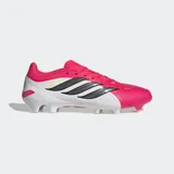 Championes de fútbol Adidas Predator League para terreno firme, con diseño en color fucsia y blanco con las icónicas tres tiras en negro. Presentan tecnología Nanostrike en la parte superior para mayor ligereza y placa Strikeframe para una tracción superior.