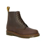 Botas de cuero estilo militar con cordones, modelo 1460 de Dr. Martens. Presentan un acabado en cuero Crazy Horse de aspecto envejecido, costuras amarillas características en la vira y suela de goma AirWair resistente.