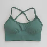 Top deportivo color lila, con breteles finos y espalda deportiva.