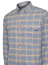 Camisa de franela a cuadros de manga larga RKF modelo Padua, confeccionada en algodón orgánico. Presenta cuello camisero, cierre frontal con botones de madera y dos bolsillos en el pecho con solapa y botón.