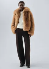 Jersey de punto fino con cuello perkins y manga corta, confeccionado en una mezcla de lana y cashmere.