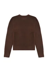 Sweater de manga larga confeccionado en tejido de punto suave. Presenta un diseño clásico con cuello redondo y terminaciones acanaladas en puños y bajo.