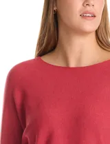 Buzo de punto rib con diseño de manga japonesa en largo tres cuartos y silueta relajada.