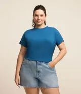 Blusa tipo muscle tee de Ashua, confeccionada en tejido ribana con textura acanalada, cuello redondo y diseño sin mangas.