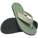 Ojotas Havaianas Surfer Coast, color negro, con tiras de tela texturizada y suela con diseño ondulado.