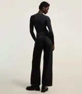 Body básico de poliamida y elastano color borgoña, con cuello redondo y mangas largas.