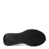 Championes slip-on Umbro negros de tela tejida, con el logo de la marca en el lateral y suela gruesa con diseño texturizado.