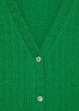 Chaleco de tejido de crochet con escote en pico y cierre frontal con botones, de diseño recto y largo.