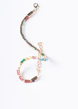 Pulsera tennis recta con zirconias multicolor y cadena dorada.