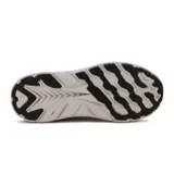 Championes deportivos Diadora modelo Proton para mujer, con capellada en tejido de punto color celeste claro, detalles en negro y naranja vibrante. Presentan una entresuela gruesa y texturizada en tonos grises y naranja, ofreciendo amortiguación.