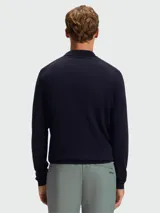 Buzo de punto Hugo Boss modelo Ever-X PL, de manga larga y color azul marino, con cuello polo, cierre frontal parcial y logo de la marca bordado en el pecho.