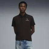 Polo de manga corta color negro, con cuello clásico y cierre de botones. Presenta el logo de Puma y el emblema de McLaren Racing estampados en el pecho.