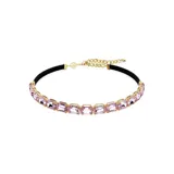 Gargantilla con cristales morados en talla octogonal y engarce dorado. Cierre ajustable con cadena dorada y cinta de terciopelo negra.