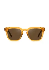 Lentes de sol con armazón de acetato biodegradable en color ámbar translúcido y diseño cuadrado ligeramente extragrande. Cuentan con lentes oscuros con protección UV 400.