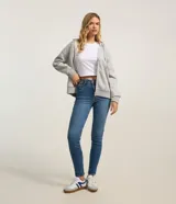 Jean skinny de tiro alto color azul, con diseño ajustado y efecto lavado.