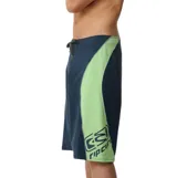Boardshort Rip Curl Sseries Panel Cordura de 22", color azul marino con paneles laterales en verde claro, cordón ajustable en la cintura y estampa en la pierna izquierda.