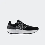 Championes de running New Balance modelo 520, de color negro con suela blanca Fresh Foam y detalles en gris.