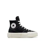 Championes Converse Cruise de caña alta, color negro con detalles en blanco, plataforma con diseño geométrico y logo de la marca en el lateral.