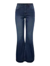 Jean de tiro alto, corte slim flare, en denim de sarga color azul medio con efecto levemente desgastado. Presenta cierre de botón y cremallera.