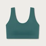Top deportivo de tejido acanalado sin costuras, con escote redondo y diseño de espalda estilo nadadora. Ofrece un ajuste ceñido y soporte medio.