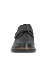 Zapato de cuero negro con cierre de velcro, suela de goma EVA flexible y diseño ergonómico.