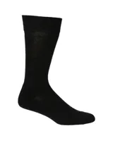 Medias de caña media color negro, con planta acolchada y puño suave. Incorporan tecnología antimicrobiana.