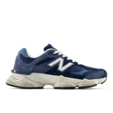 Championes New Balance 9060 unisex, color azul con detalles en blanco y beige. Confeccionados en malla y gamuza, con logo "N" característico en los laterales y entresuela con amortiguación ABZORB y SBS.