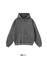 Canguro gris oscuro de algodón con capucha y bolsillo tipo canguro. Tiene un acabado desgastado y corte oversize.