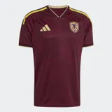 Camiseta de fútbol Adidas de la selección de Venezuela, modelo Primera Equipación 26. Color principal granate con detalles en amarillo dorado en cuello y hombros. Presenta un estampado integral sutil con textura.