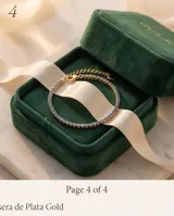 Pulsera de plata 925 con baño dorado, decorada con circonias azules en todo su contorno y cierre de mosquetón con cadena de alargue y dije de corazón.