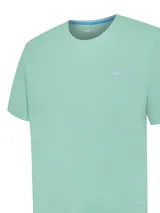 Remera de jersey color verde agua, de corte recto, cuello redondo y manga corta.