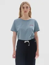 Pantalón tejido de algodón color negro, con franja lateral en contratono y pequeño tajo en el lateral inferior.