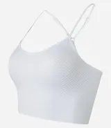 Top deportivo blanco texturizado, con breteles finos ajustables y copas removibles.
