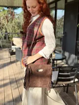 Chaleco de paño fino con estampado escocés en tonos rojo, verde y marrón.