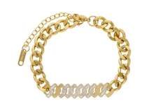 Pulsera dorada de acero con eslabones gruesos y apliques de circonias.