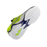 Championes deportivos Joma modelo Set 2403, de color azul marino y amarillo fluor con detalles plateados y suela blanca con motas.