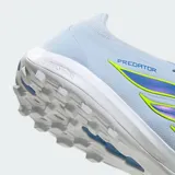 Championes de fútbol Adidas Predator League para pasto sintético, color celeste con detalles en azul y amarillo. Presentan lengüeta plegable, tecnología Powerspine para mayor estabilidad y malla Nanostrike para un ajuste preciso.