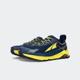 Championes de trail running Altra Olympus 5, color azul con detalles en naranja y suela Vibram.