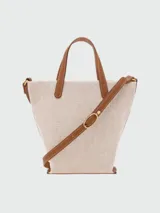 Cartera crossbody XS de Longchamp, modelo Complice, confeccionada en lona de algodón color beige con bolsillo frontal y detalles en cuero color marrón.