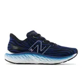 Championes de running New Balance Fresh Foam EVOZ, con capellada de tejido técnico a rayas horizontales en azul y negro, logo "N" en los laterales y entresuela Fresh Foam en blanco y celeste.