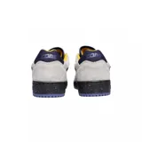 Championes Converse CONS AS-1 Pro Suede, color gris con detalles en azul marino y amarillo.