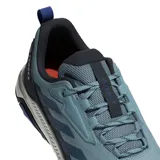 Championes de trekking Adidas Terrex Anylander, color celeste con detalles en negro y suela en tono gris claro. Presentan diseño de malla transpirable con refuerzos sintéticos, cordones ajustables y logo Terrex en el lateral y la lengüeta.