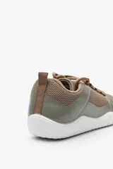 Championes deportivos Paddock Jumps color beige, con diseño de malla y cordones.