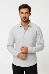 Buzo negro de cuello redondo con el texto "MAN EDITION" estampado en el pecho, de manga larga con puños elastizados y diseño liso.